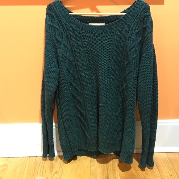 Dark green knitted winter sweater