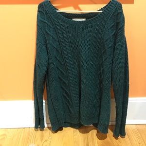 Dark green knitted winter sweater