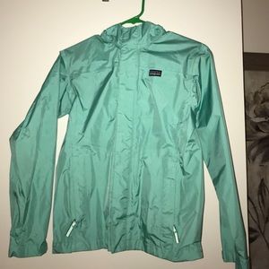 Teal Patagonia rain jacket