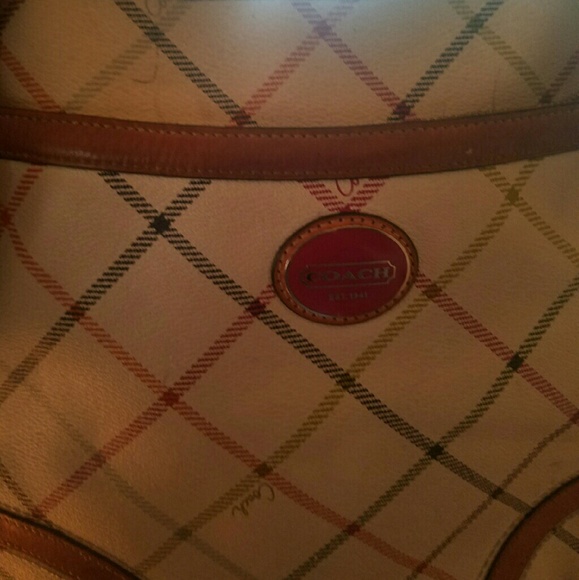 Old coach crosz over bag
