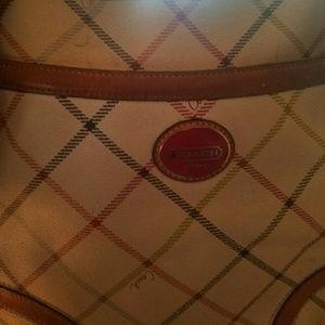 Old coach crosz over bag