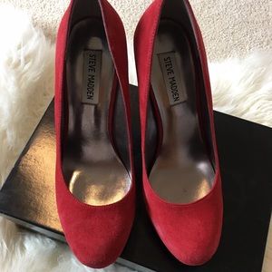 Steve Madden red pumps.
