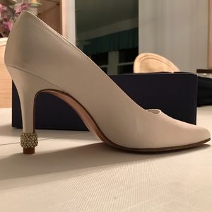 Stuart Weitzman white satin shoe with stone detail