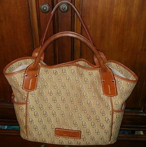 Tan Dooney & Bourke with leather trim.