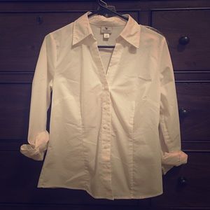 White collard button down shirt.