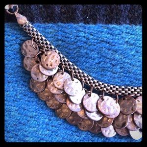 Eye-catching bronze ribbon necklace