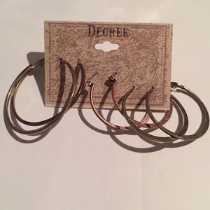 Decree Fashion set of 3 Hoops Earrings gold tones.