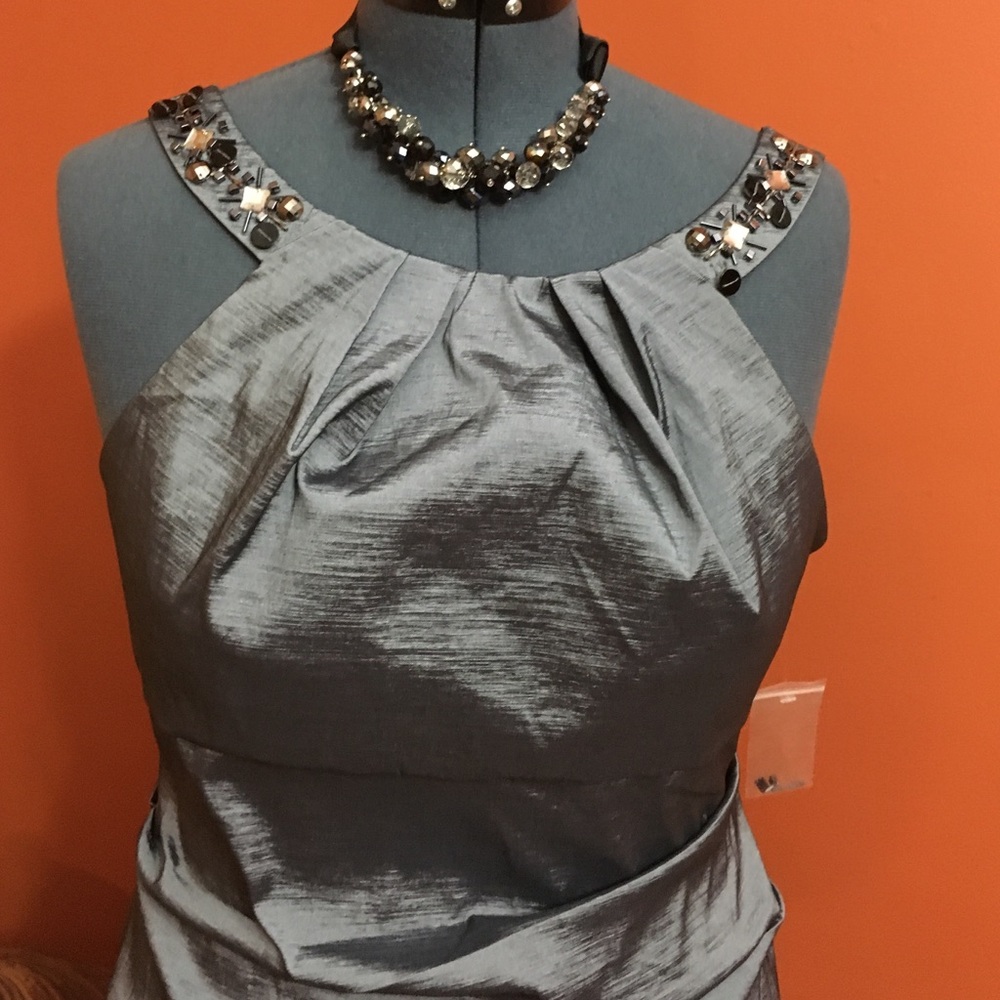 Brand new shimmer dress is cut small, it's HOT!