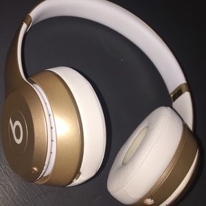 Gold Wireless Beats headphones