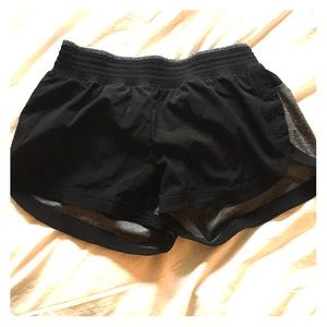 Similar to lululemon's athletic running shorts.