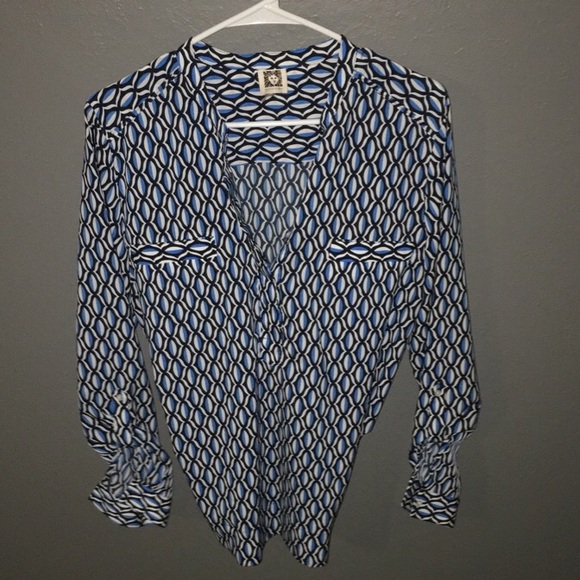 Quarter button down patterned blouse