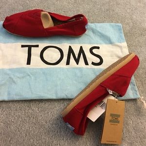 Red TOMS canvas slip on shoes