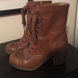 Brown leather side zipper heeled boots