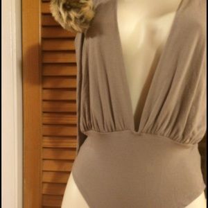 Long sleeve shoulder cut out deep v-neck bodysuit!