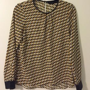 Blouse with leather detail