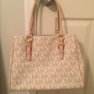White and tan MK purse