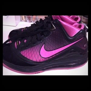 Girls- Nike Lebrons, black and pink in color.