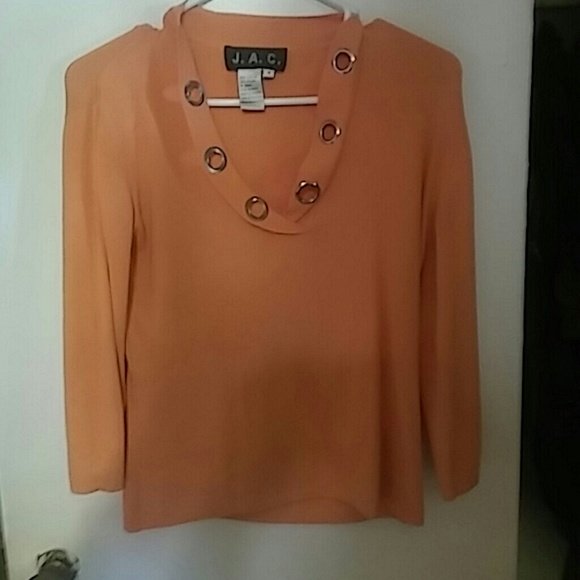 Tangerine colored cardigan