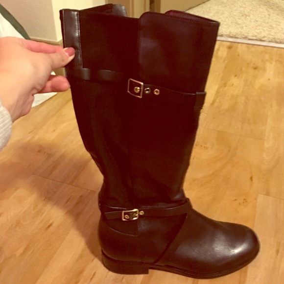 cole Haan black leather boots.