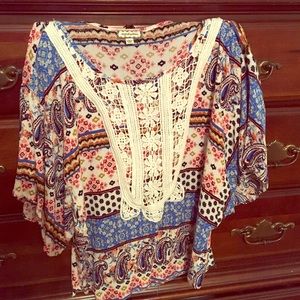 Feminine casual top with lace. Department store