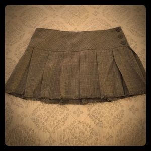 Tweed like pleated mini skirt