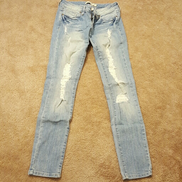Light blue ripped jeans