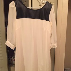 White dress with faux leather collar