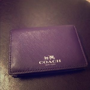 Small purple Coach wallet