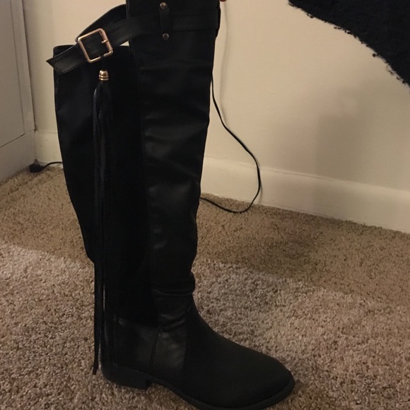 Knee high boots with fringe