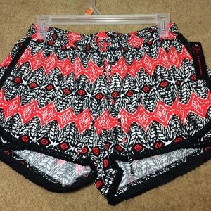 Red white and black designed shorts