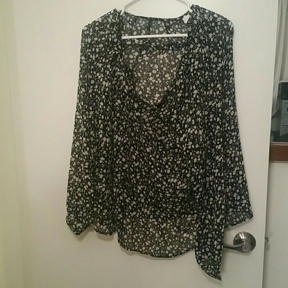 Black flowered blouse.