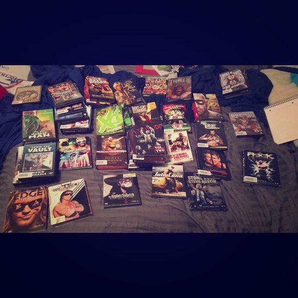 Looking for WWE/TNA dvds,Posters,books and Tshirts