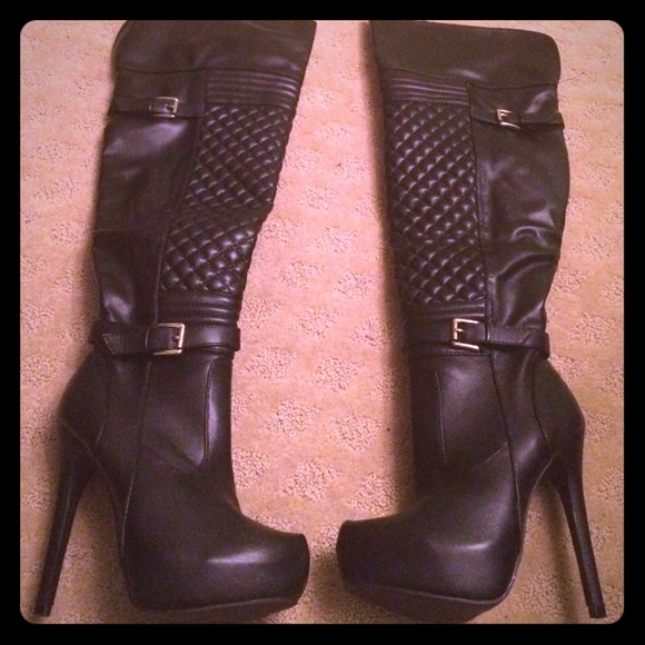 Knee high heeled boots