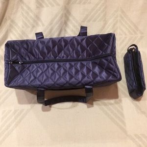 Brand new blue weekender with matching make up bag