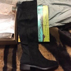 Over the knee black boots