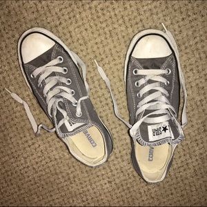 Gray low-top Converse sneakers