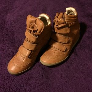 Steve Madden leather heeled sneakers.