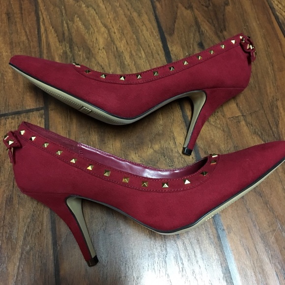 Red suede gold studded stilettos.