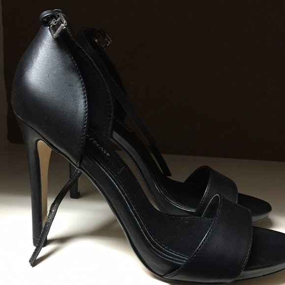 Black open toe heels.