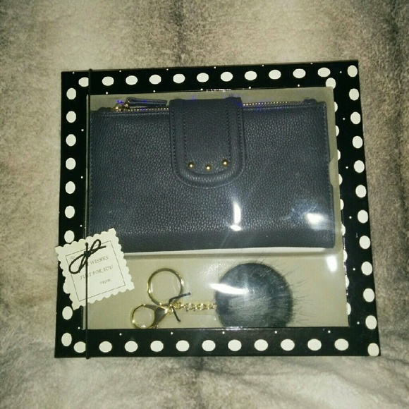 Clutch with fuzzy keychain