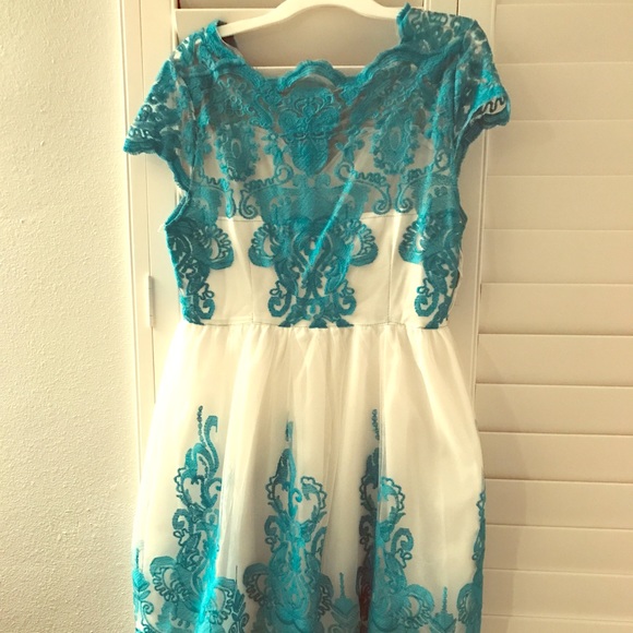 Beautiful lace white and turquoise dress