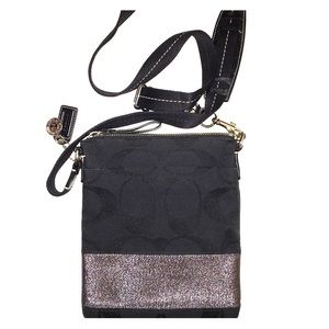 Black Coach crossbody with metallic detail