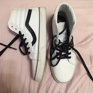 Cute white and blck high top vans