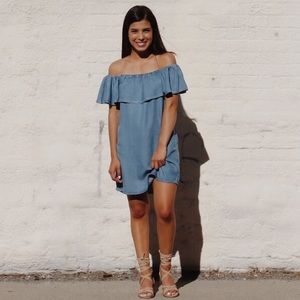 Off the shoulder dress.
