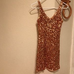 body hugging gold dress