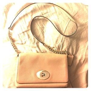 Beige Coach cross body purse. Gently used