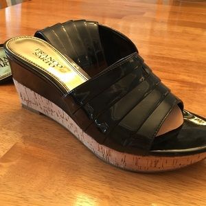 Black patent leather sandals by Franco Sarto