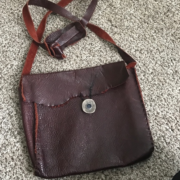 Hand sewn burgundy leather bag