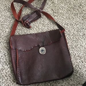 Hand sewn burgundy leather bag