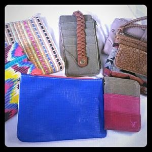 3 makeup bags, 4 wallets.